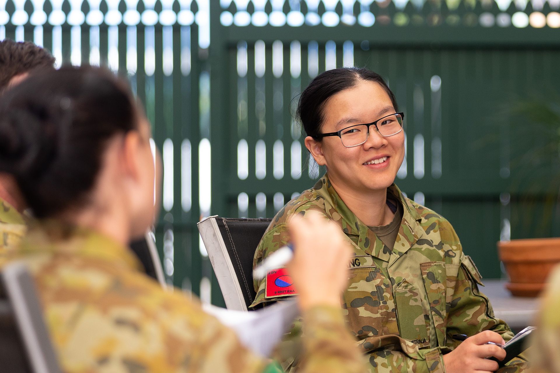 Army Reserve Combat Medic Victoria smiles towards the camera.