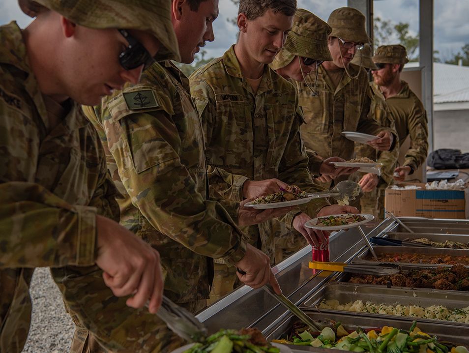 Troops derve themselves from the buffet.