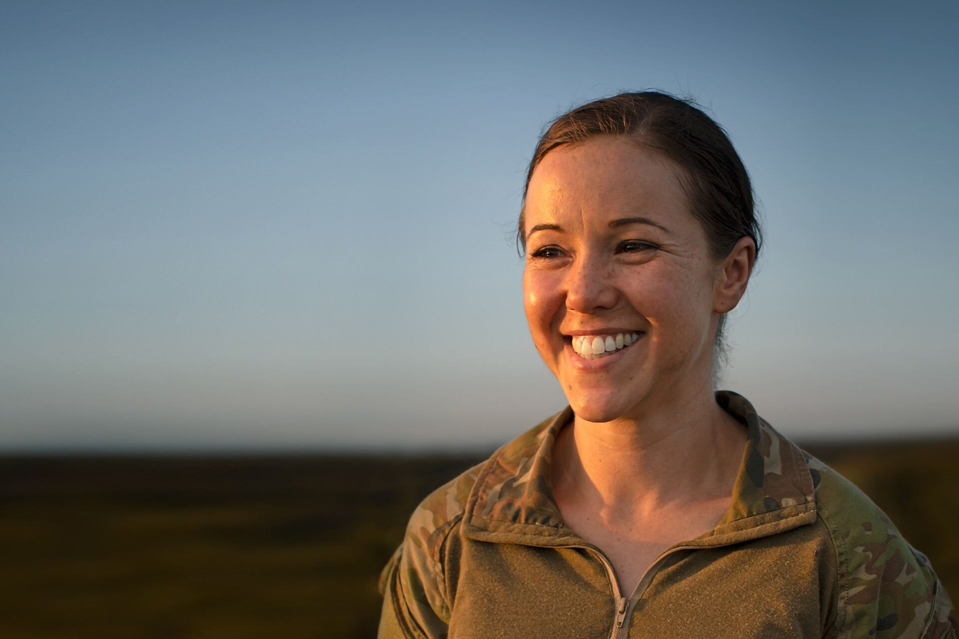 Army Reserve Combat Medic Victoria smiles towards the camera.